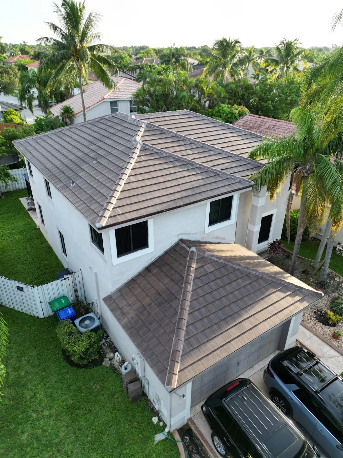 Completed tile roof by Titan on a South Florida home at golden hour